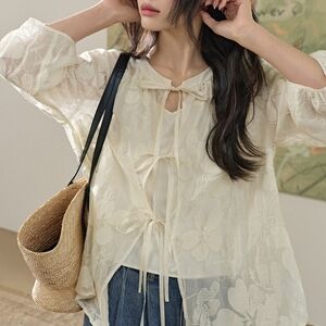 Chic Cream Camisole with Floral Accents